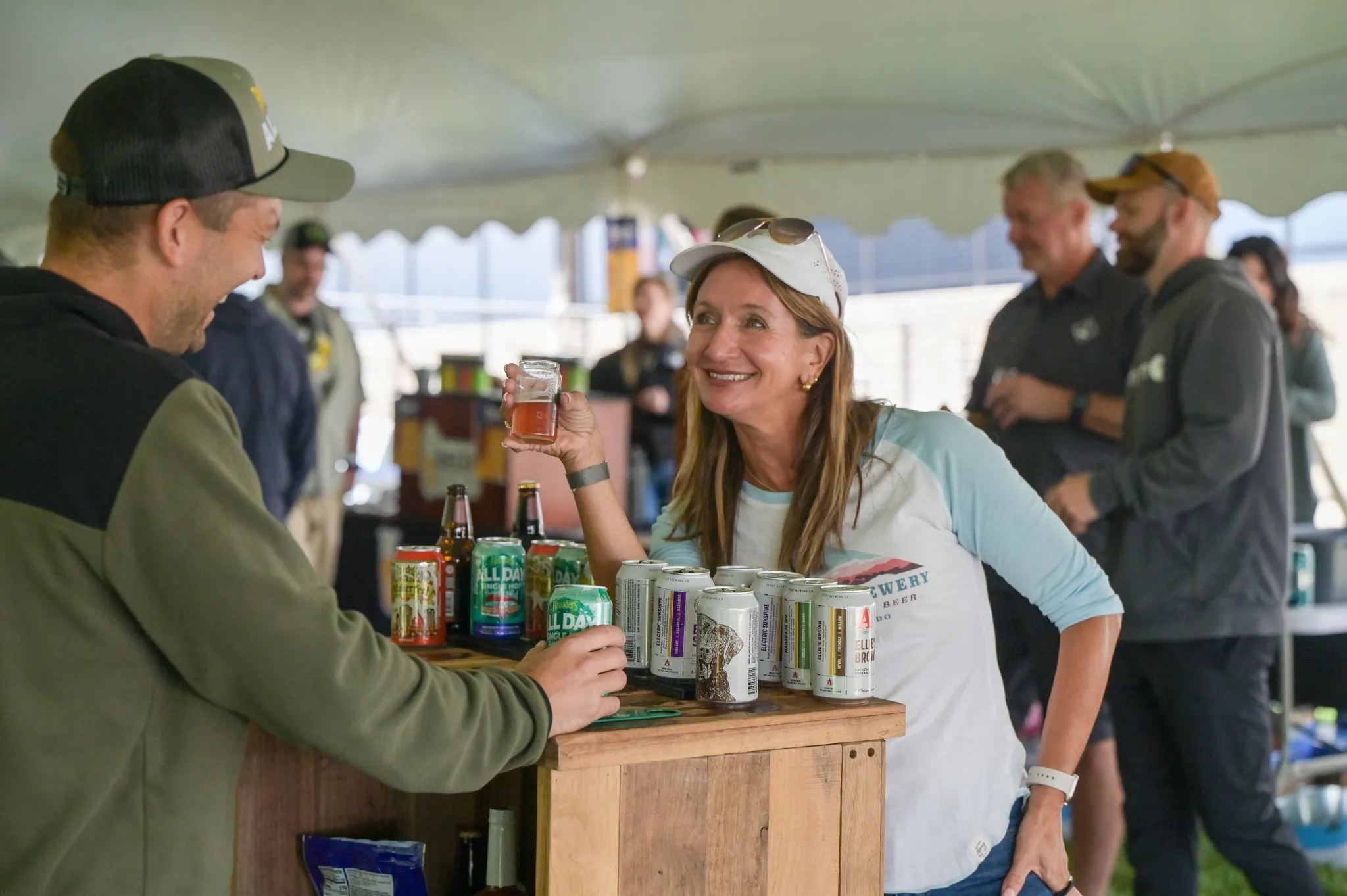 Guest at a beer vendor booth in the beer tent