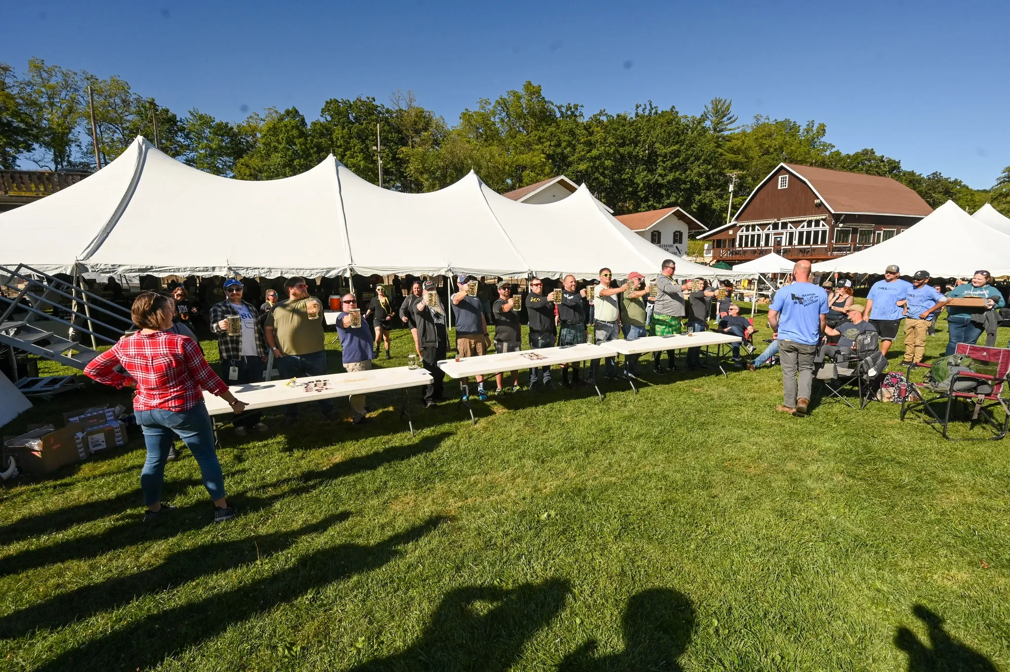 Steinholding competition table in front of the beer tent