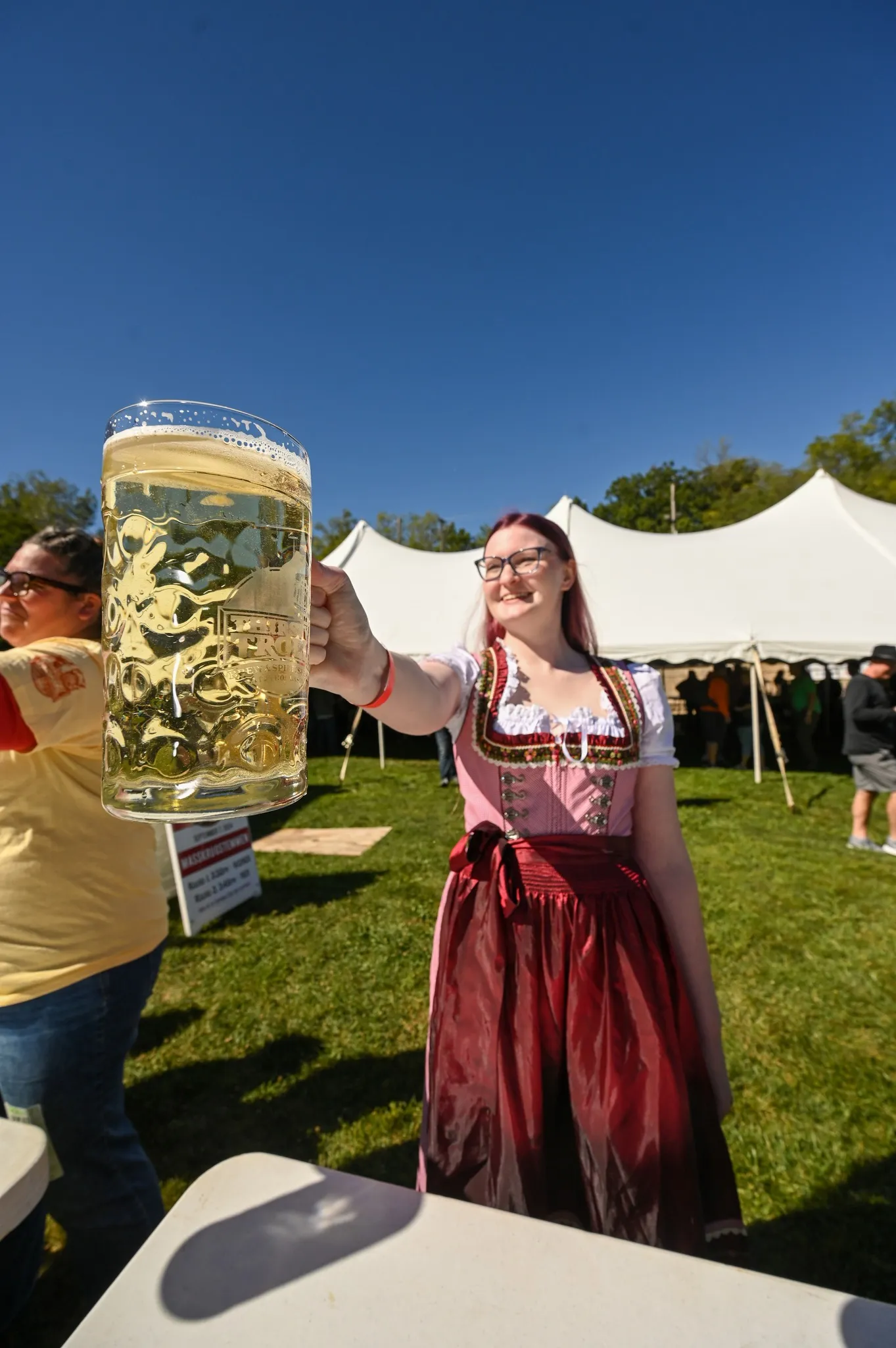 Female steinholding competitor holding a stein of beer